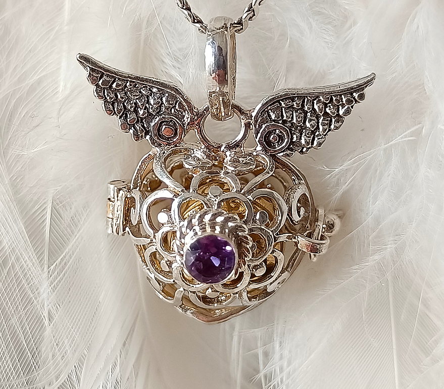 Llamador de ángel con alas
